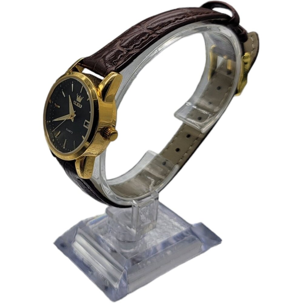 Woman's wrist watch by Olevs, with buckle clasp.